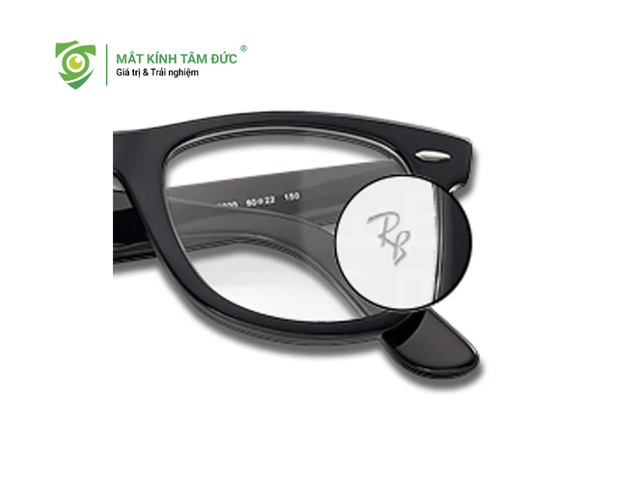 Logo RB khắc laser ẩn trên tròng kính Ray-Ban chính hãng.